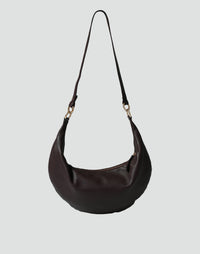 HYER GOODS The Ring Bag hobo bag in dark chocolate leather, front view showing circular ring detail and spacious design.