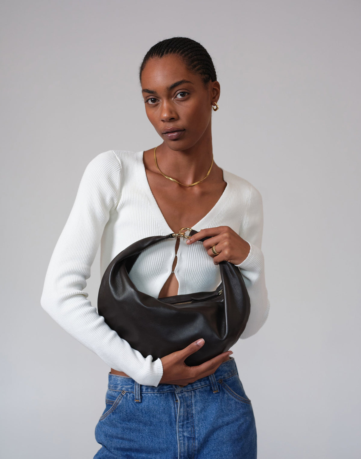 HYER GOODS Ring Bag hobo bag in rich chocolate leather with a unique ring handle and spacious interior.