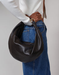 HYER GOODS Ring Bag, chocolate brown hobo bag with round ring handle and soft leather texture.