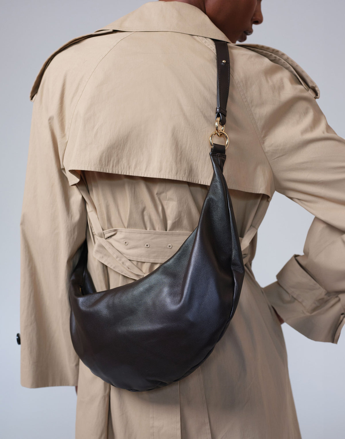 HYER GOODS Ring Bag hobo bag in chocolate leather with circular ring detail and adjustable strap, stylish and versatile accessory.