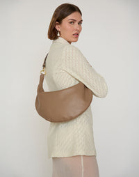 HYER GOODS Ring Bag hobo bag in taupe with circular handle and sleek design, perfect for stylish everyday use.
