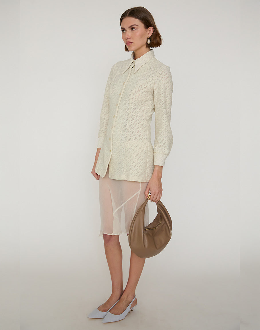 Taupe hyer goods Ring Bag hobo bag with circular ring handle and soft leather texture, stylish and versatile accessory.