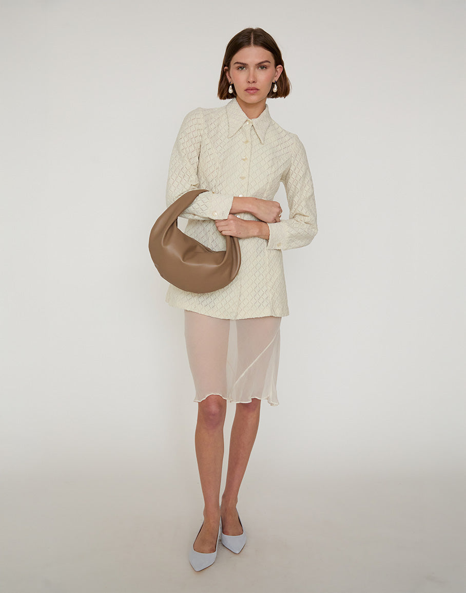 Taupe HYER GOODS Ring Bag hobo bag with circular ring handle and soft leather material, stylish and functional accessory.