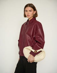Off-white HYER GOODS Ring Bag hobo style with rounded ring handle and minimalist design, perfect for casual or chic outfits.