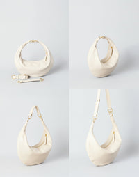 HYER GOODS Ring Bag hobo bag in off-white with four-way carrying options, showcasing its versatile and stylish design.