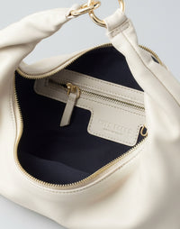 HYER GOODS Ring Bag hobo bag in off-white with interior view, showcasing its spacious design and minimalist style.