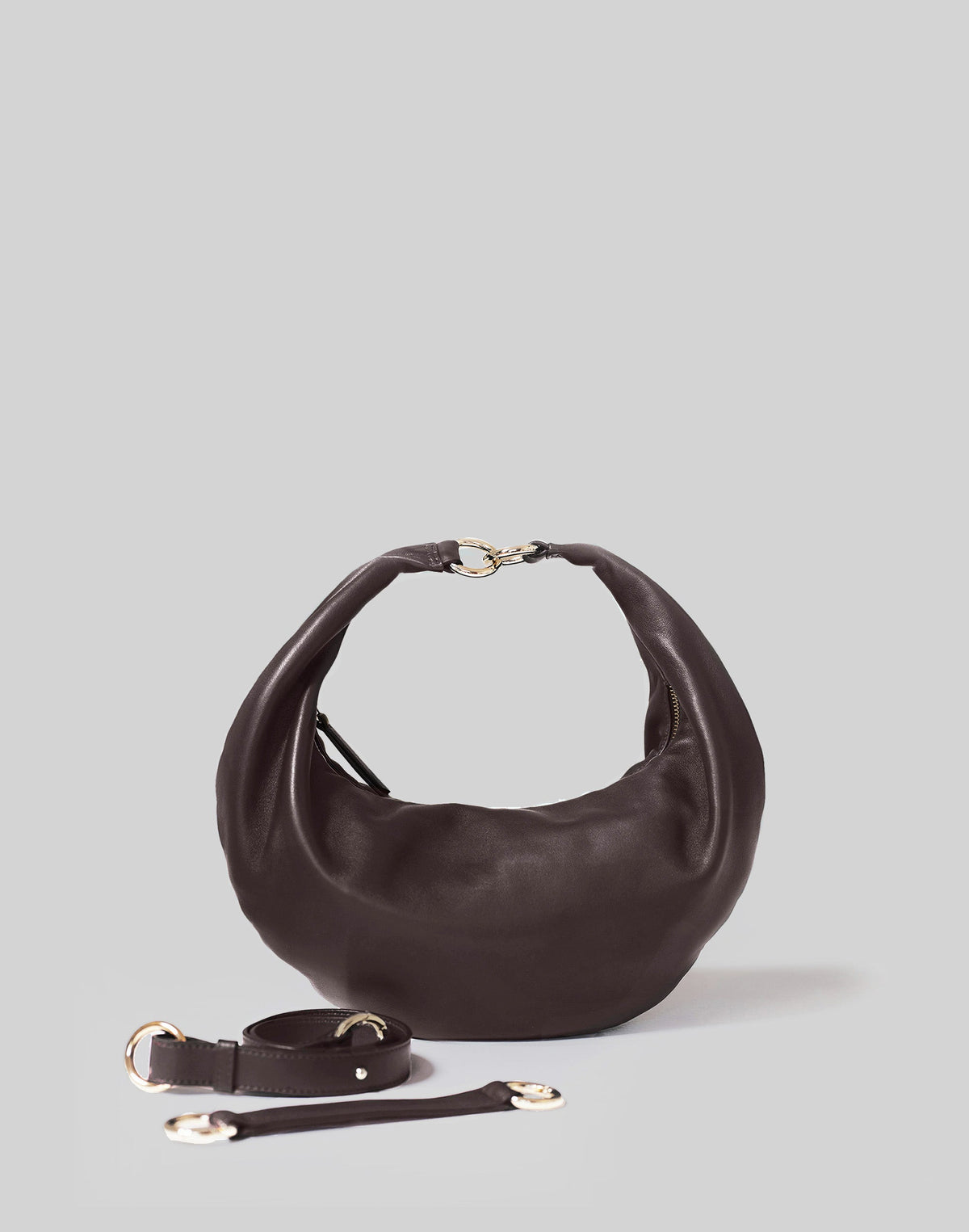 HYER GOODS Ring Bag hobo bag in chocolate leather with adjustable straps and a distinctive ring detail.