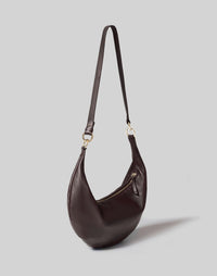 HYER GOODS Ring Bag hobo in chocolate leather with circular handle, crossbody strap, and minimalist design.