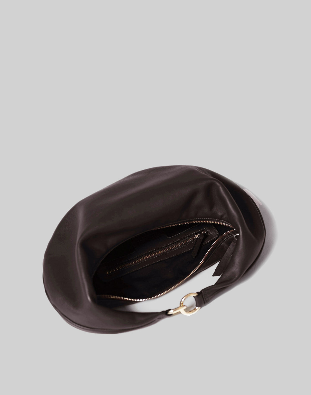 HYER GOODS The Ring Bag hobo bag in chocolate leather, showing the interior with spacious compartments and stylish design.