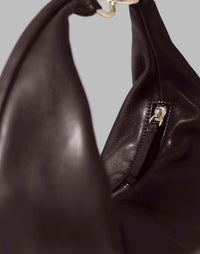 HYER GOODS Ring Bag hobo bag in chocolate leather with circular ring handle and detailed stitching.