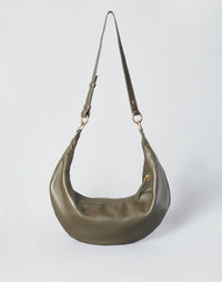 Olive Nappa leather hobo bag by HYER GOODS with circular ring handle and minimalist design.