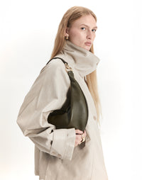 Olive Nappa leather hobo bag from HYER GOODS with a large ring handle and shoulder strap, stylish and functional accessory.