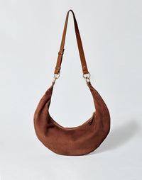 HYER GOODS Hobo Bag, The Ring Bag in praline suede with a rounded ring handle and soft, textured leather surface.