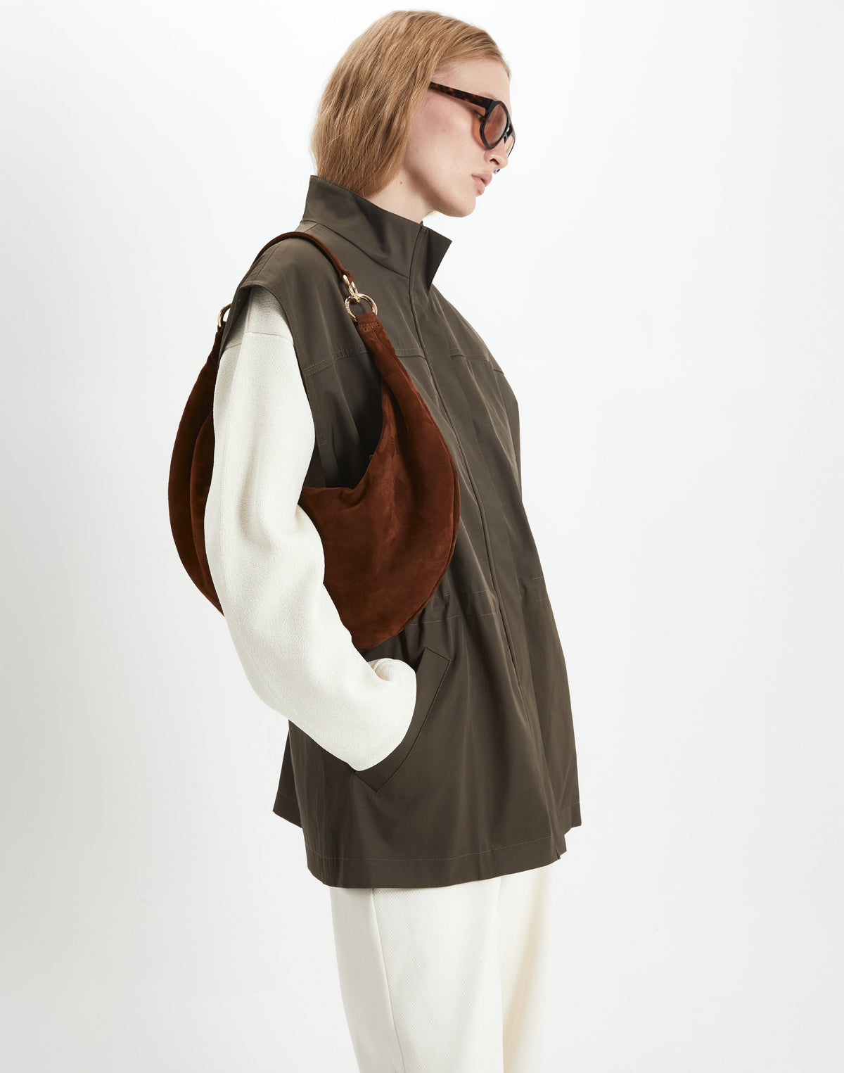 HYER GOODS Ring Bag hobo bag in praline suede with circular ring handle and minimalist design.
