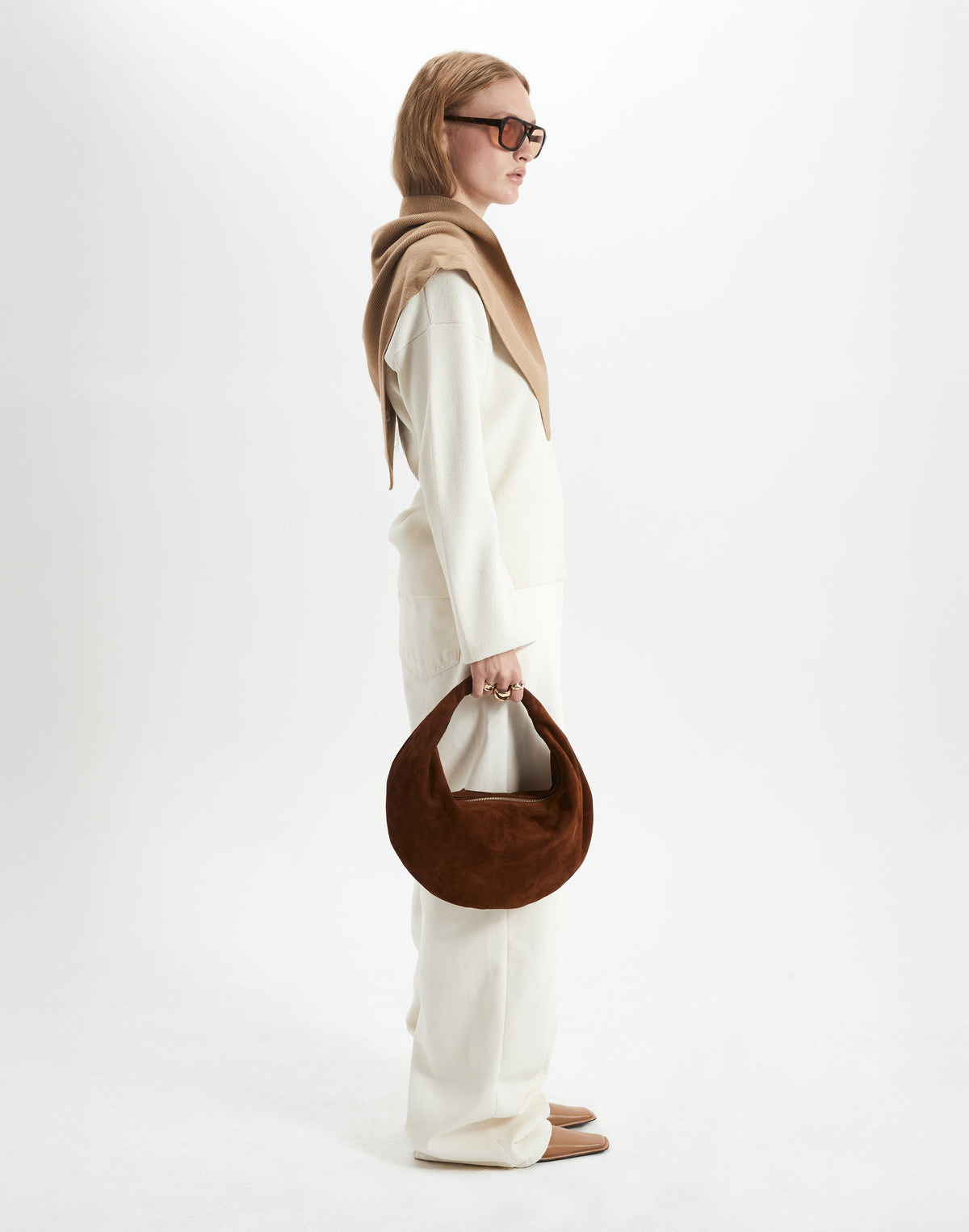 HYER GOODS Ring Bag, hobo style in praline suede with circular ring handle and soft textured leather design.