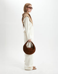 HYER GOODS Ring Bag, hobo style in praline suede with circular ring handle and soft textured leather design.