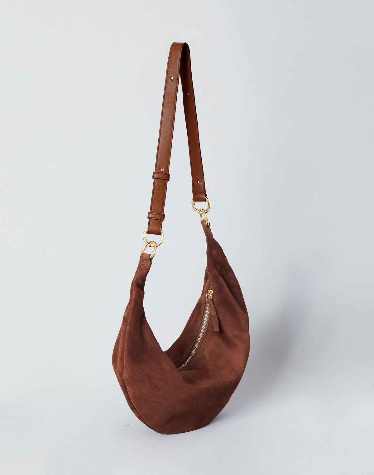 HYER GOODS Ring Bag hobo bag in praline suede featuring a rounded ring handle and soft, textured leather surface.
