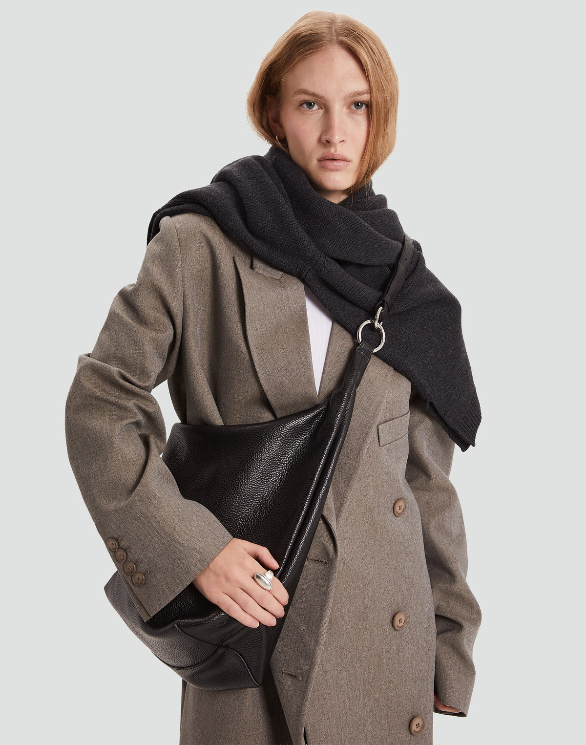 HYER GOODS black and silver hobo ring bag with adjustable strap and spacious interior, stylish and versatile for everyday use.