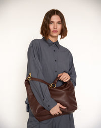 Brown HYER GOODS Hobo Ring Bag with rounded hobo shape and stylish strap, perfect for casual and chic outfits.