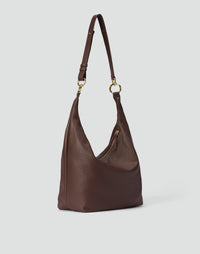 Brown HYER GOODS Hobo Ring Bag with rounded leather design and adjustable shoulder strap, stylish and spacious for everyday use.