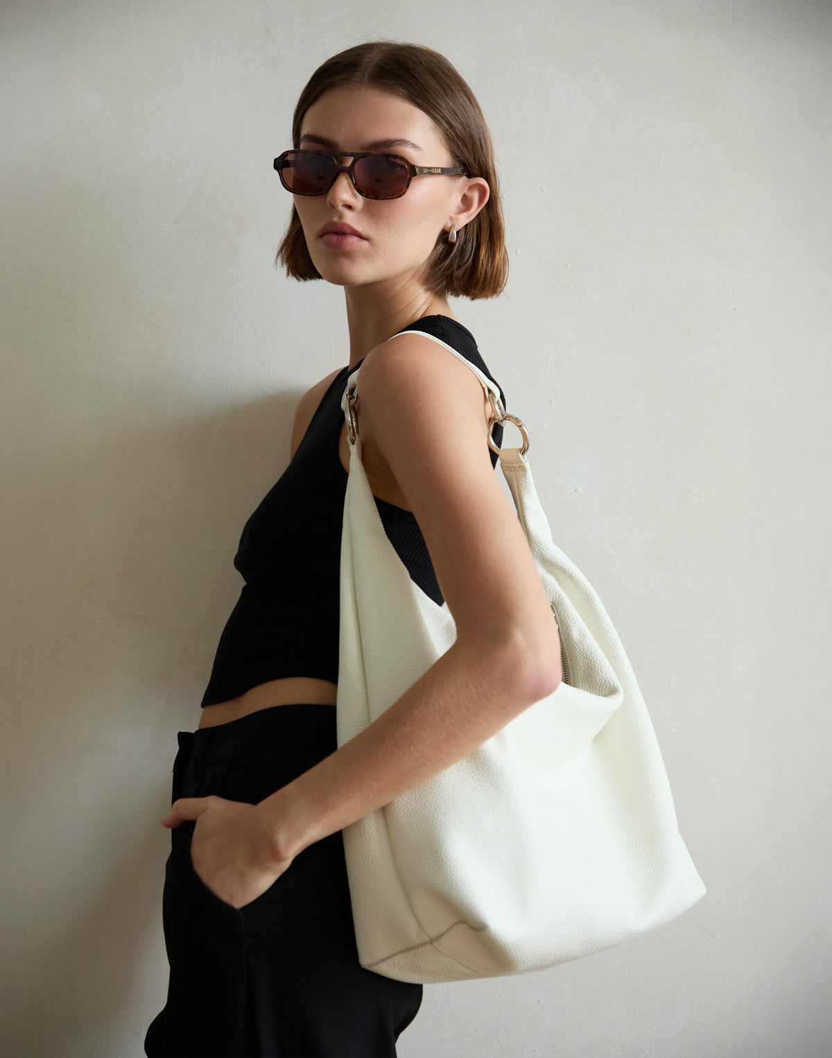 White HYER GOODS Hobo Ring Bag with rounded handle and spacious interior, stylish and functional hobo bag design.