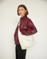 White HYER GOODS Hobo Ring Bag with adjustable crossbody strap and rounded silhouette, stylish and functional accessory.
