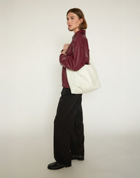 White HYER GOODS Hobo Ring Bag with crossbody strap, soft leather design and spacious interior for everyday use