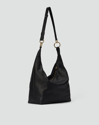 Black and gold Hobo Bag by HYER GOODS featuring a spacious design and stylish shoulder strap.