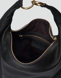 Black and gold Hobo Bag from HYER GOODS featuring a versatile, spacious design with a rounded shape and adjustable strap.
