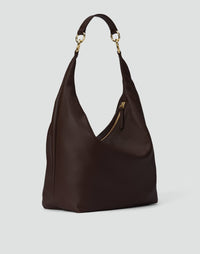 Dark chocolate leather Hobo Ring Bag by HYER GOODS, featuring a versatile hobo bag design with ring accents.
