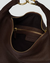 Dark chocolate-colored HYER GOODS Hobo Ring Bag with rounded shape and adjustable strap, stylish and spacious for everyday use.