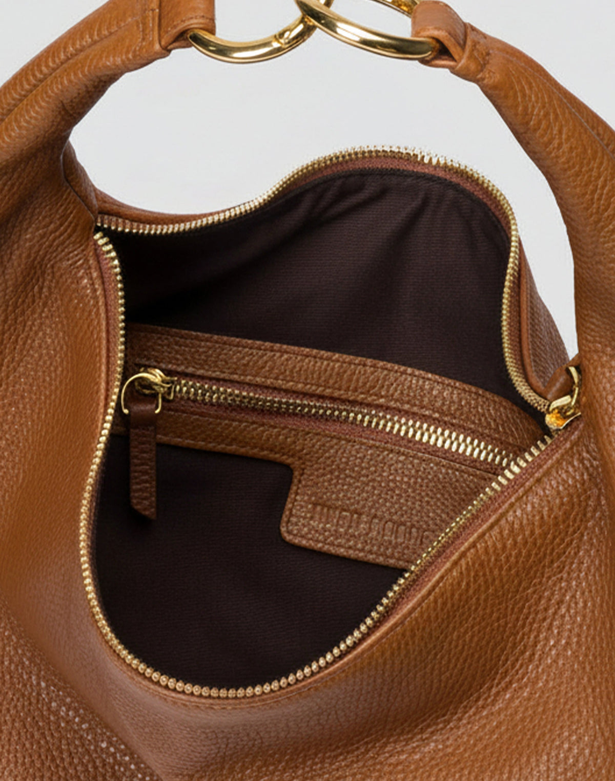 HYER GOODS Hobo Ring Bag in cognac leather, stylish hobo bag with ring detail, casual and versatile accessory.