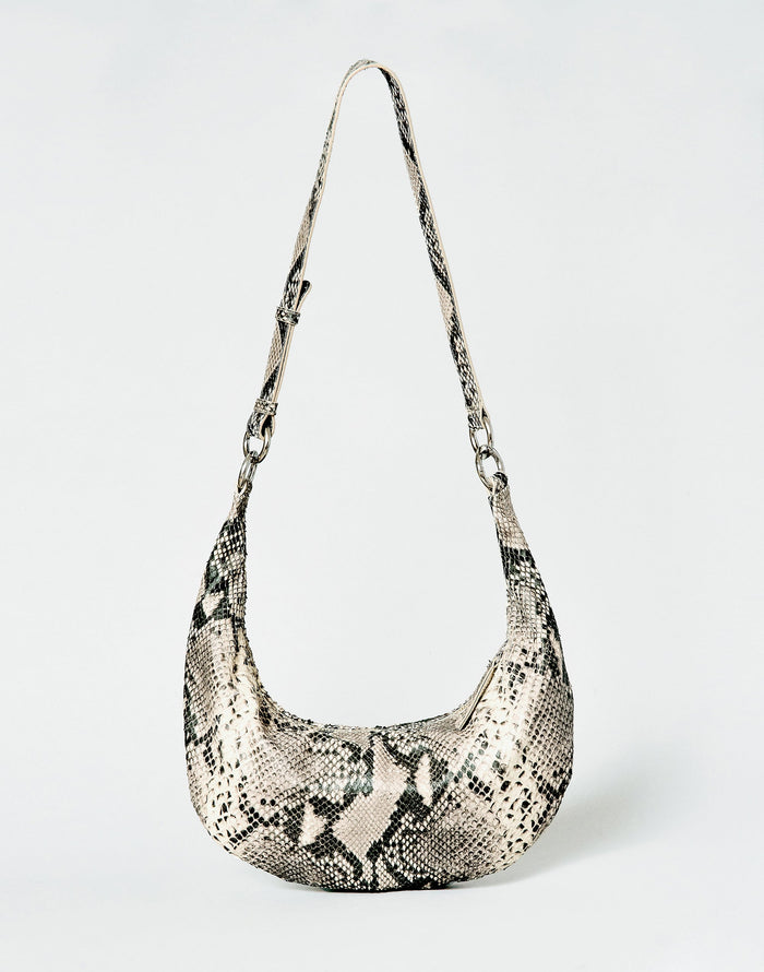 HYER GOODS Piccola Ring Bag hobo bag in python leather with circular handle and compact design.