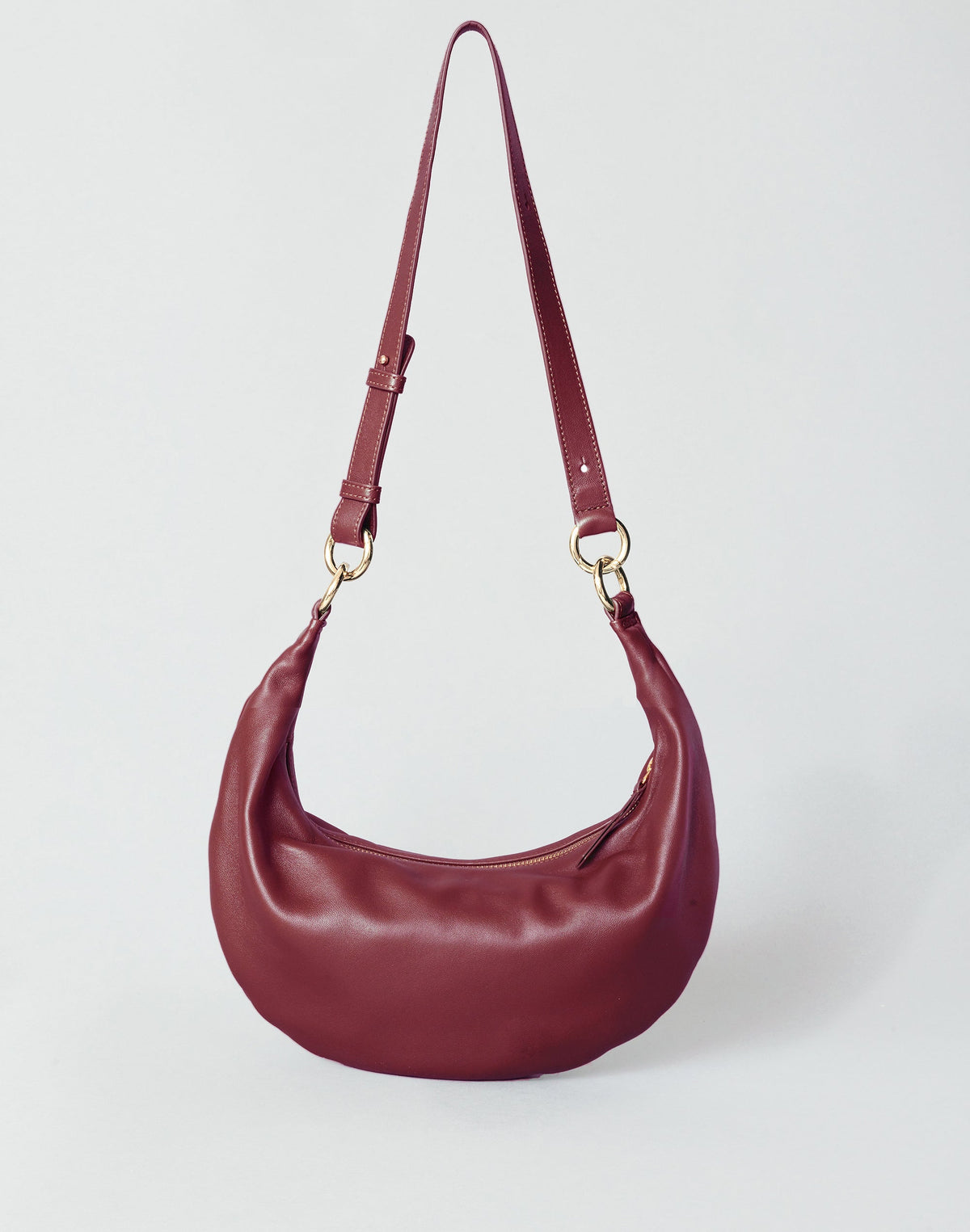 Red Nappa leather Piccola Ring Bag by HYER GOODS, stylish hobo bag with a modern design and ring detail.