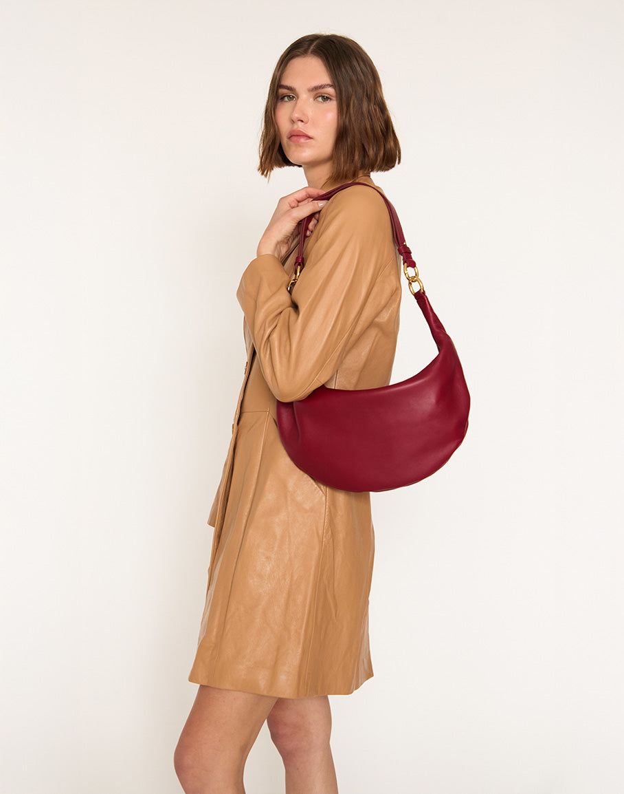 Cherry red HYER GOODS Piccola Ring Bag hobo style with round handle and compact design, perfect for everyday use