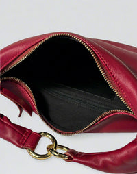 Red HYER GOODS Piccola Ring Bag hobo bag with circular handle and interior pocket, stylish and compact accessory.