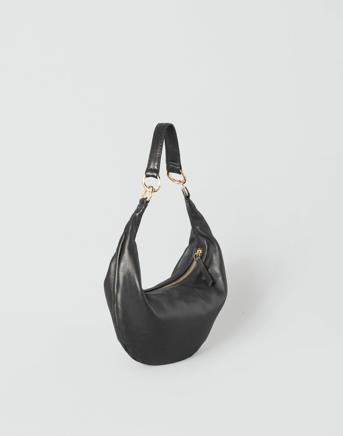HYER GOODS Piccola Ring Bag hobo bag in black with gold accents, featuring a compact design and stylish ring handle.