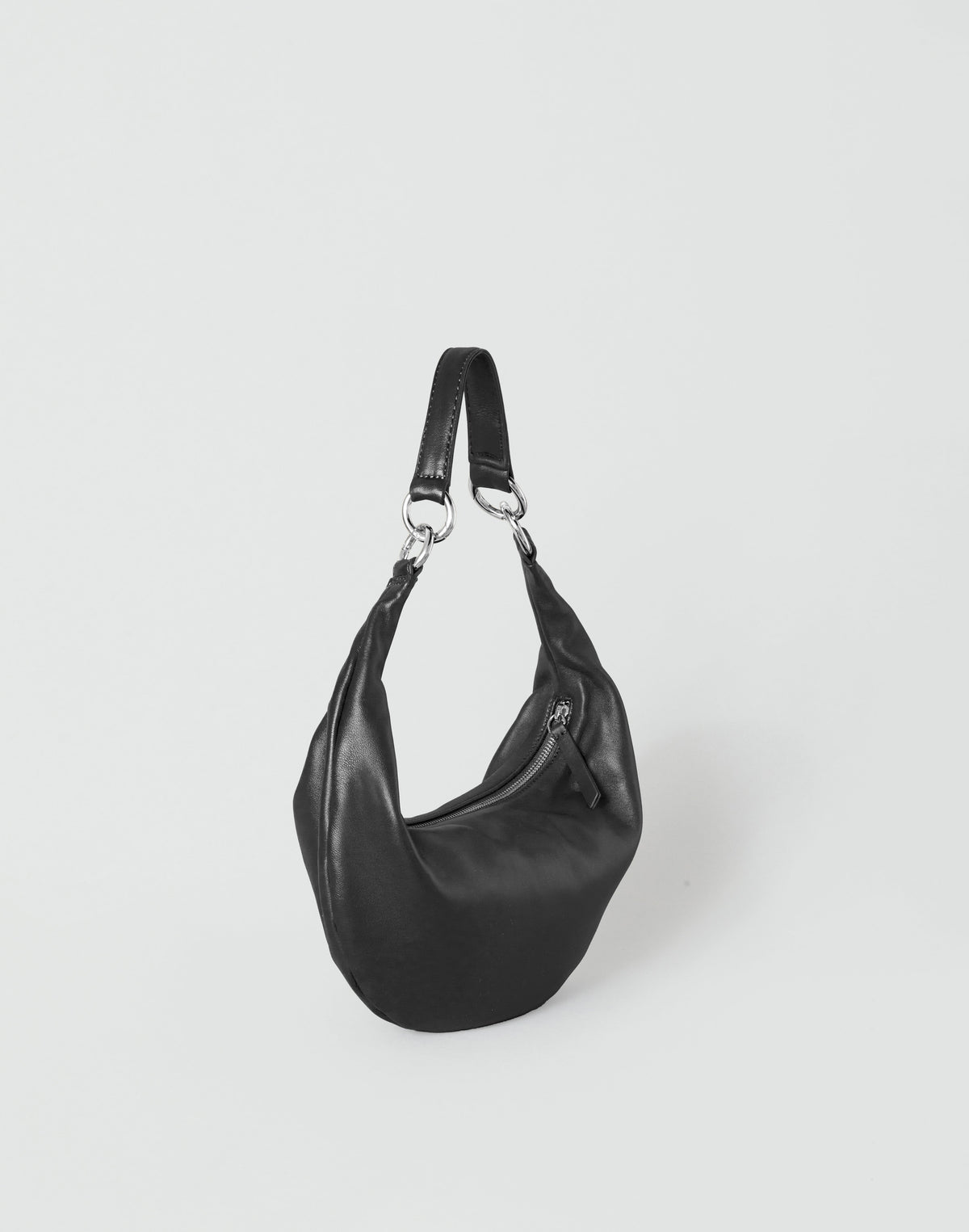 HYER GOODS Piccola Ring Bag in black and silver, a stylish hobo bag with a sleek design and metallic accents.