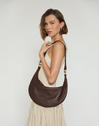 Hyer Goods Piccola Ring Bag, chocolate brown hobo bag with round handle and soft leather texture, stylish and compact.