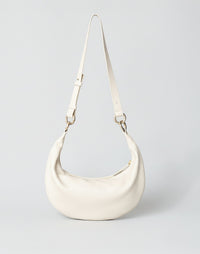 Off-white Piccola Ring Bag by HYER GOODS, a stylish hobo bag with a unique ring detail and soft leather texture.