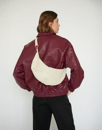HYER GOODS Piccola Ring Bag, off-white hobo bag with circular handle, stylish and compact for everyday use.