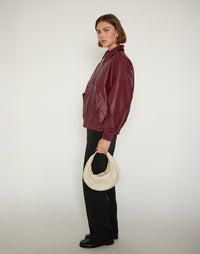 HYER GOODS Piccola Ring Bag, off-white hobo bag with circular handle and minimalist design, made from quality leather.
