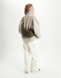 Olive Nappa leather Piccola Ring Bag by HYER GOODS, a stylish hobo bag with a circular handle and minimalist design.
