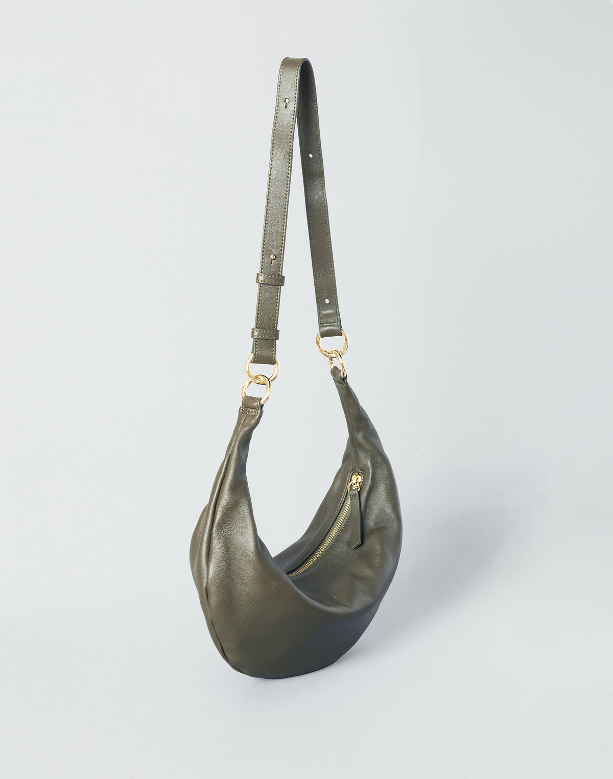 Olive Nappa leather Piccola Ring Bag by HYER GOODS, a stylish hobo bag with a rounded shape and silver ring detail.