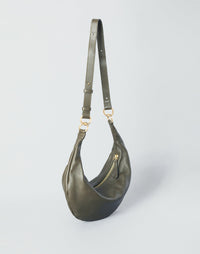 Olive Nappa leather Piccola Ring Bag by HYER GOODS, a stylish hobo bag with a rounded shape and silver ring detail.