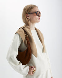 HYER GOODS Piccola Ring Bag hobo bag in praline suede with circular handle and sleek design, perfect for everyday use.