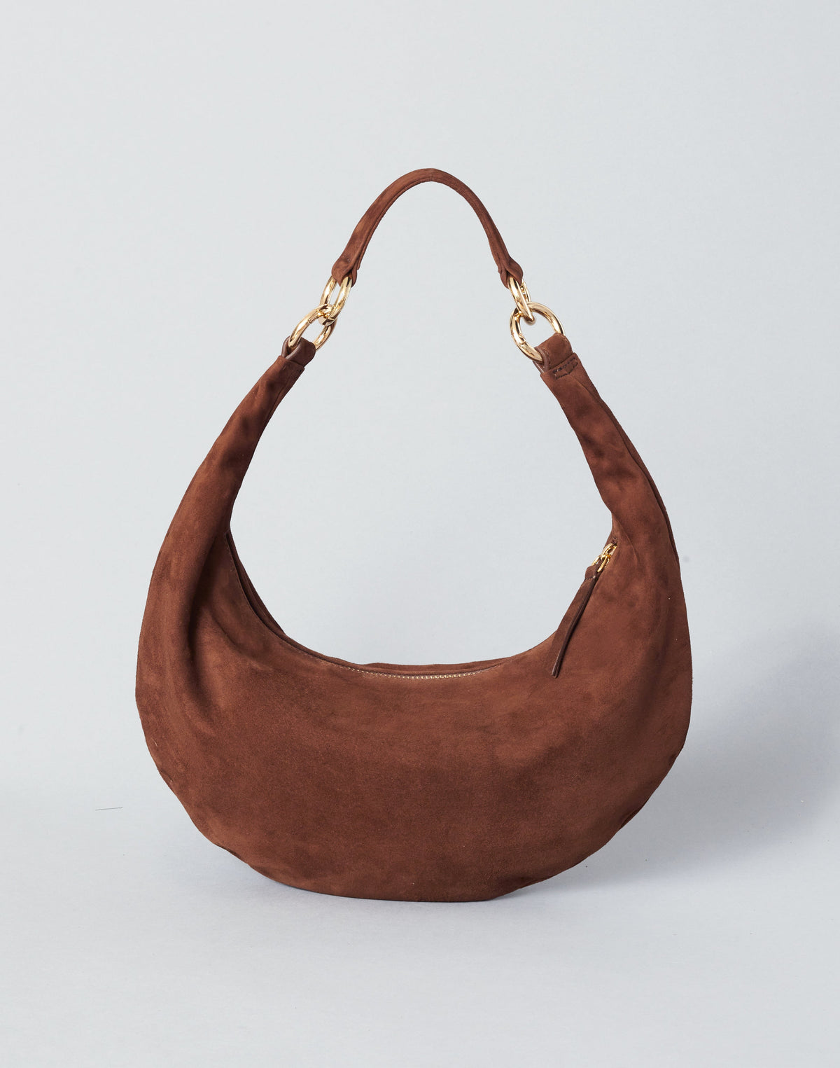 HYER GOODS Piccola Ring Bag hobo bag in praline suede with circular handle and minimalist design.