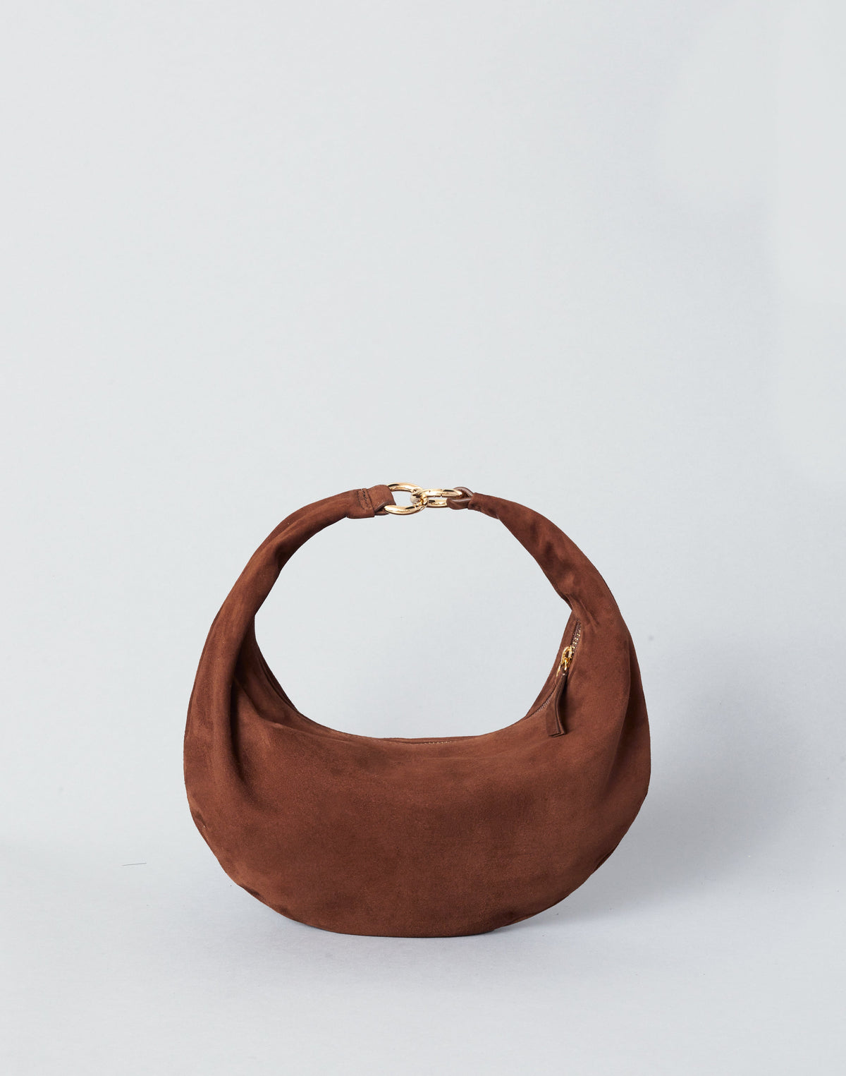 HYER GOODS Piccola Ring Bag hobo bag in praline suede with a circular handle and compact design.