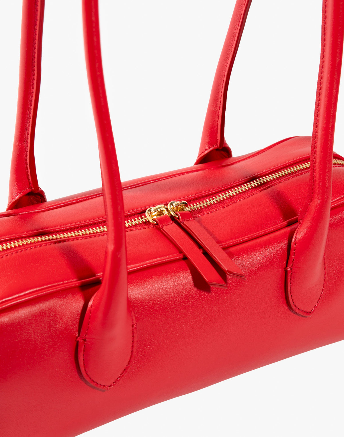 Red La Strada East West shoulder bag by HYER GOODS featuring sleek design and detailed stitching.