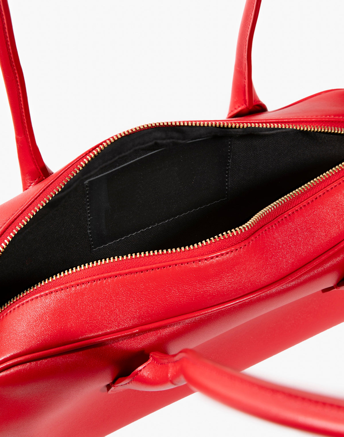 Red La Strada East West Shoulder Bag by HYER GOODS featuring a sleek design and sturdy shoulder strap.
